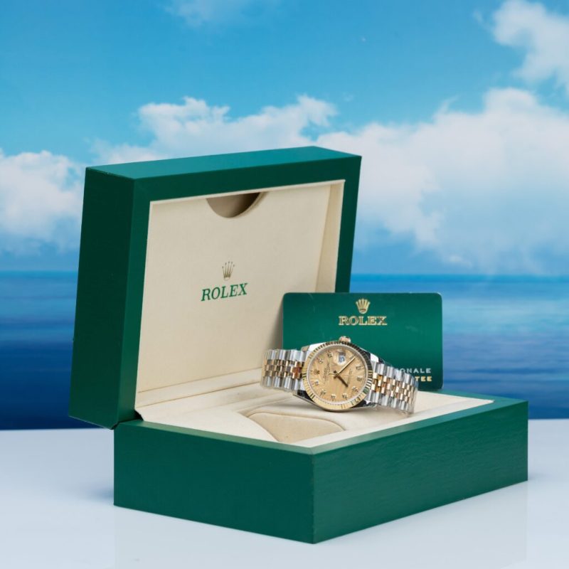 Đồng Hồ Rolex Datejust 126233 Bọc Vàng 18K Mặt Số Cây Lá Nhiệt Đới Vàng Champagne 36mm